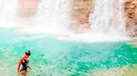 Woman-bathing-in-Salto-Alto, -located-in-Bayaguana