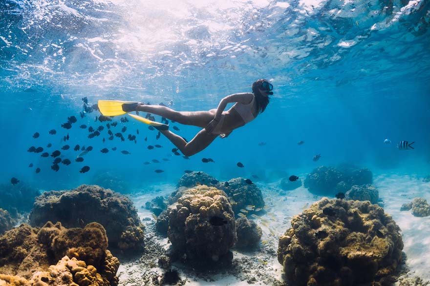 Woman snorkelling in the waters of Cabo Rojo