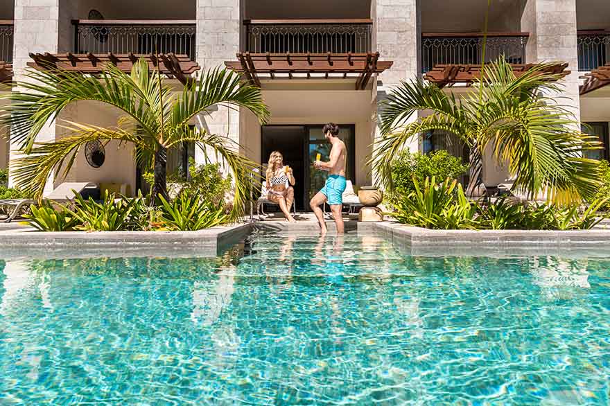 Couple resting in the pool Couple resting in the pool